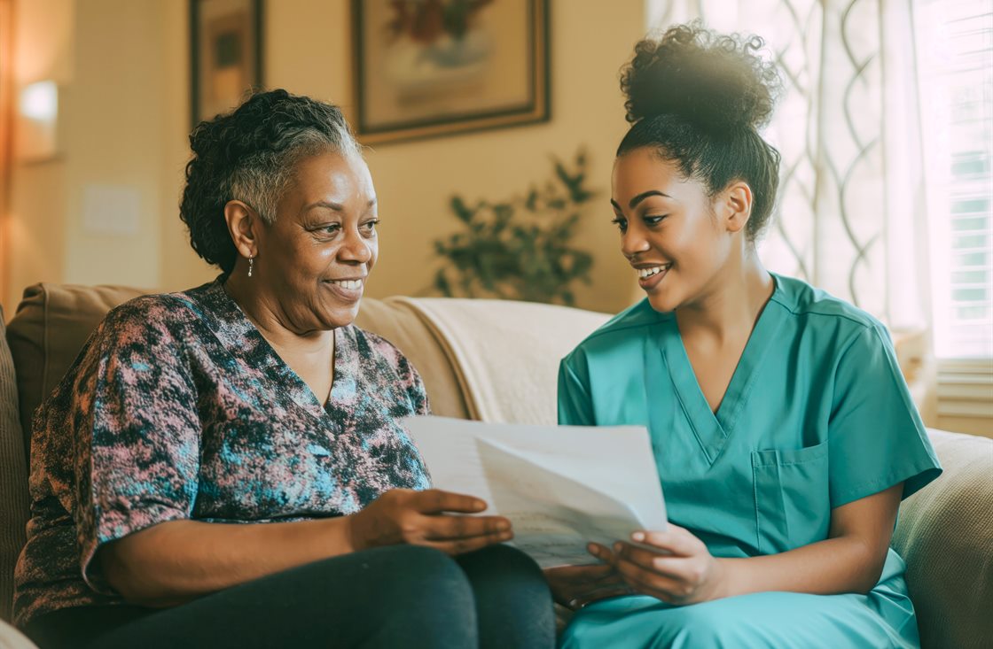 A WestHub nurse going through a care plan with a client at home